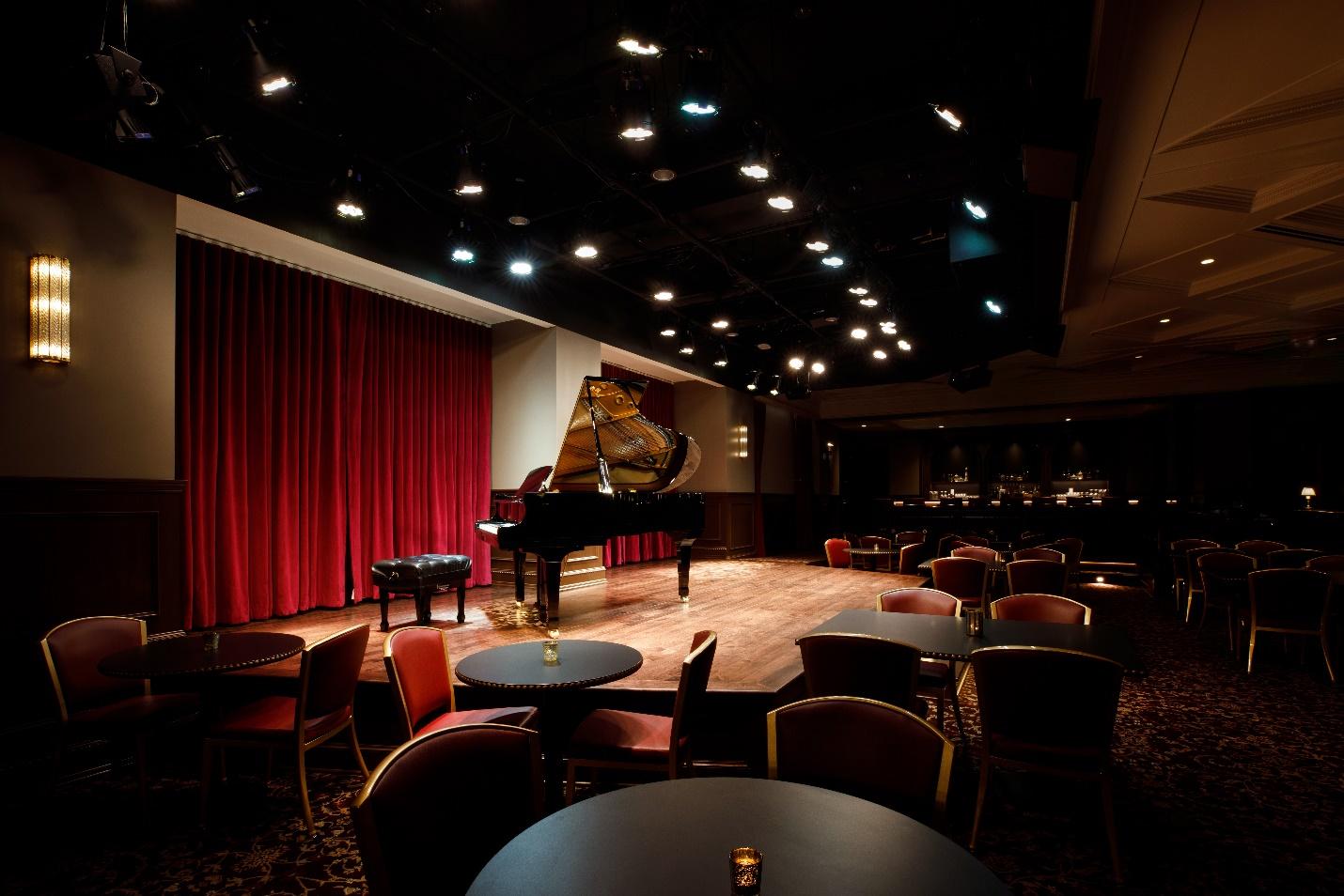 Piano stage and surrounding lounge seating