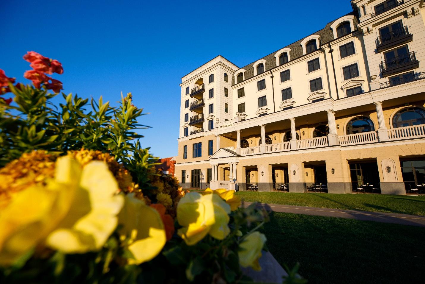 Flowers in the left corner and Hotel Carmichael on the right