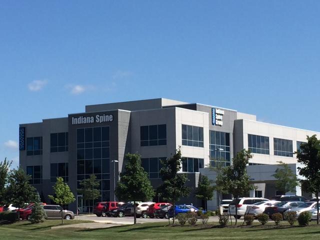 Image of building with building sign that reads 