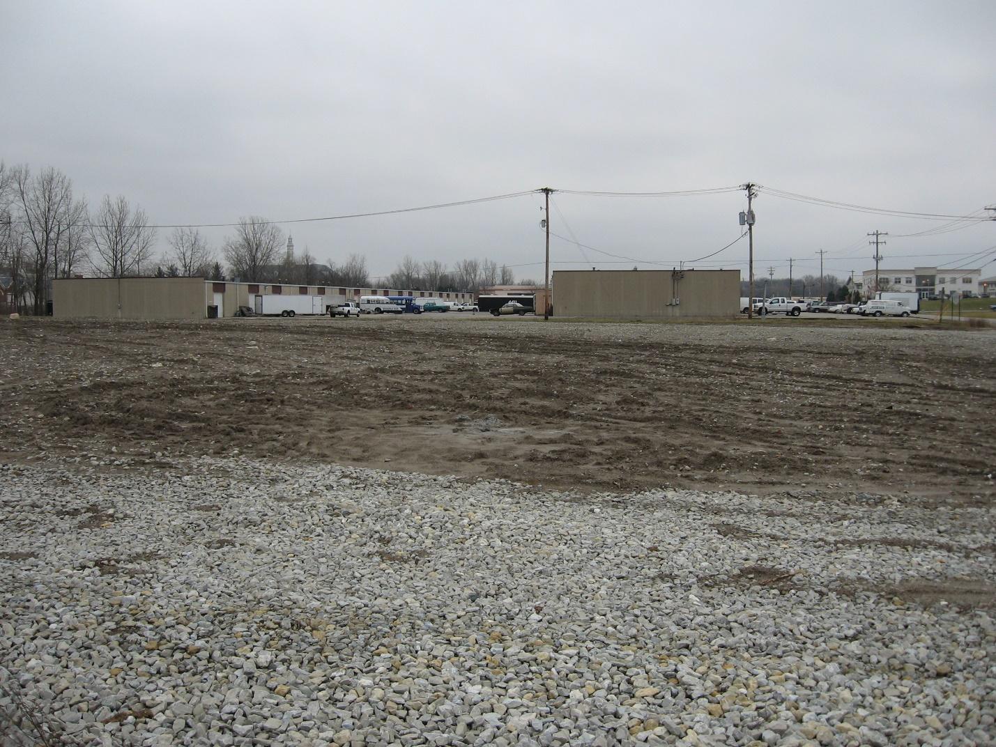 before photo of empty lot at ground level