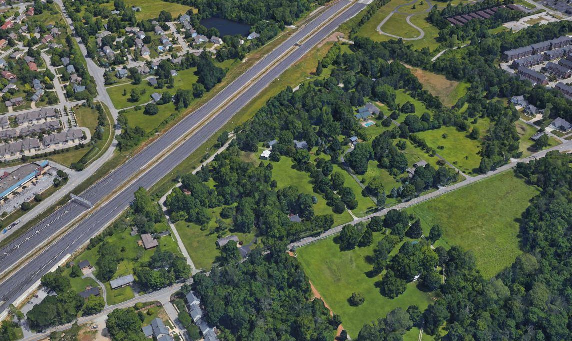 Before shot, aerial view with highway